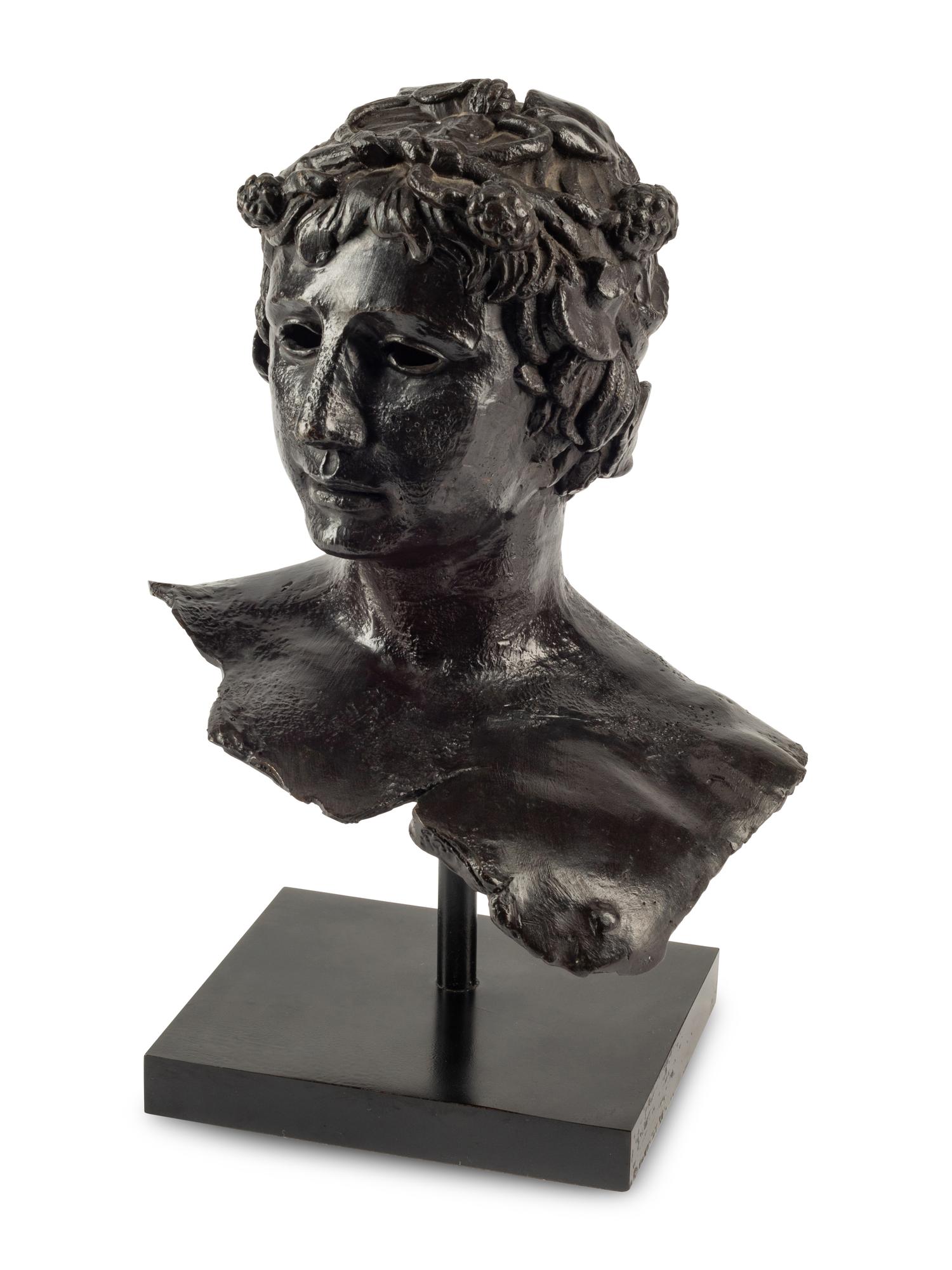 A Continental Bronze Head of Bacchus