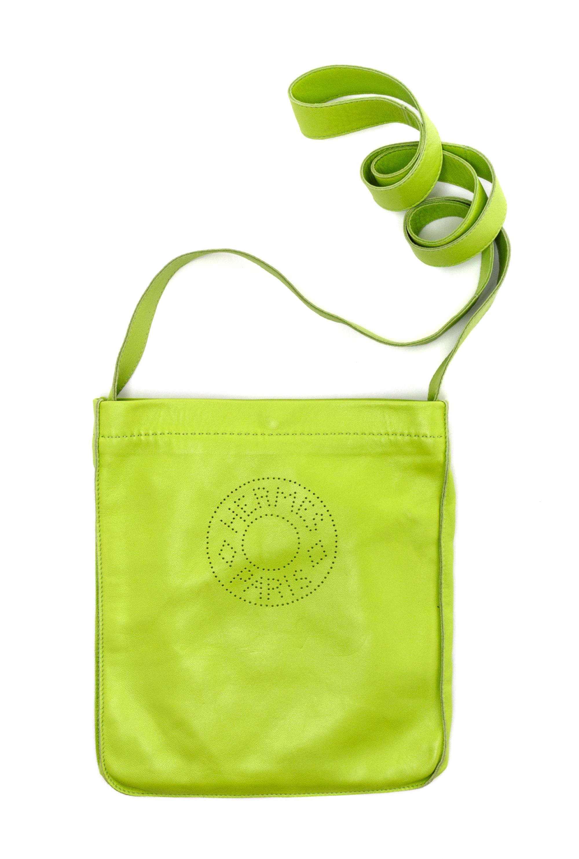 An Hermes Kiwi Agneau Clou de Selle Pouch, 6" x 9" x 1".