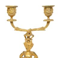 A Pair of French Gilt Bronze and Marble Figural Two-Light Candelabra