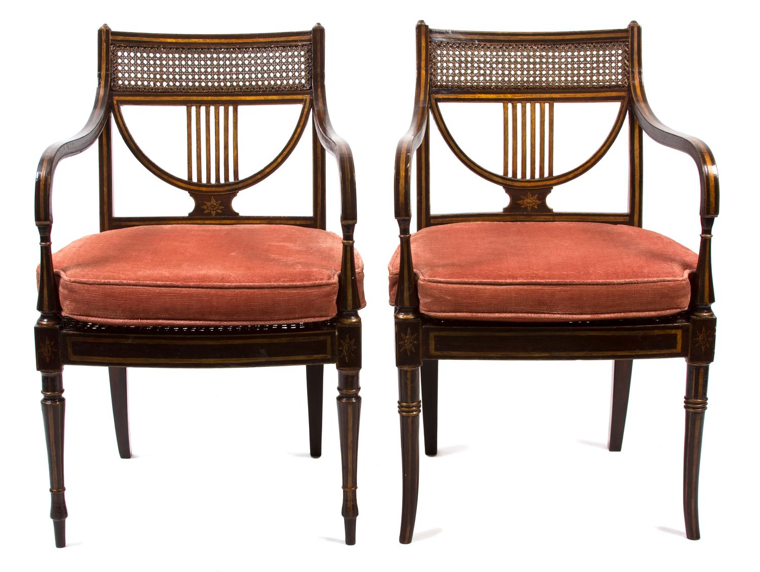 A Pair of Regency Ebonized and Gilt Painted Open Armchairs Height 34 1/4 inches. — 19TH CENTURY