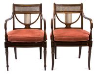 A Pair of Regency Ebonized and Gilt Painted Open Armchairs Height 34 1/4 inches. — 19TH CENTURY