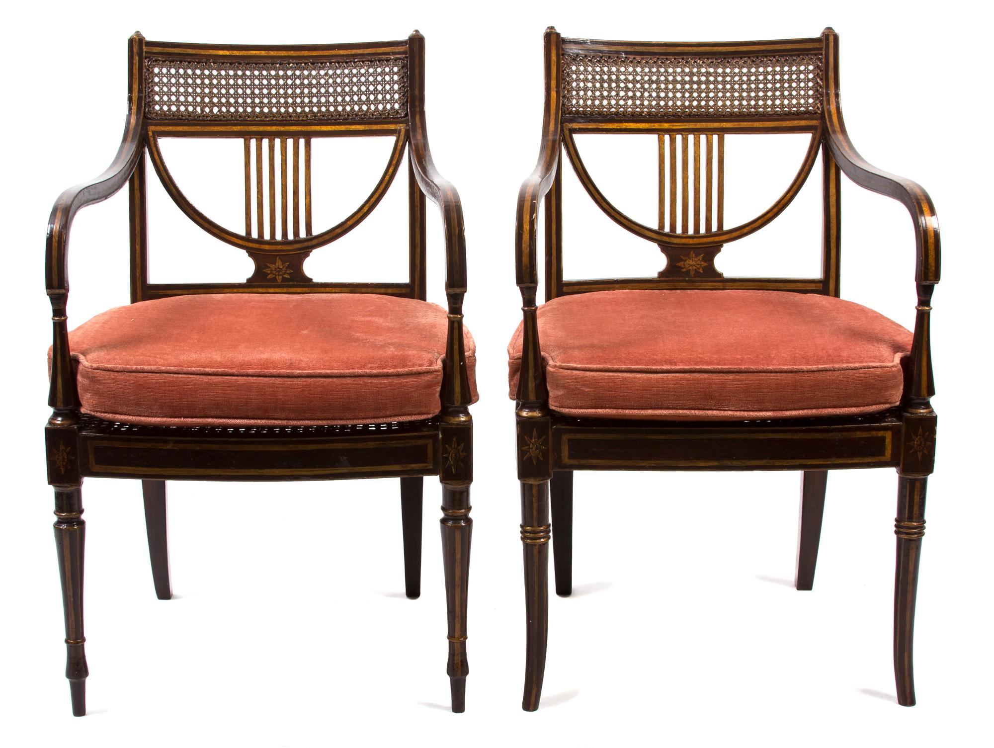 A Pair of Regency Ebonized and Gilt Painted Open Armchairs Height 34 1/4 inches. — 19TH CENTURY