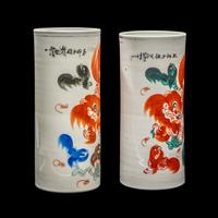Two Chinese Iron Red and Polychrome Enameled Porcelain 'Fu Lions' Hat Stands