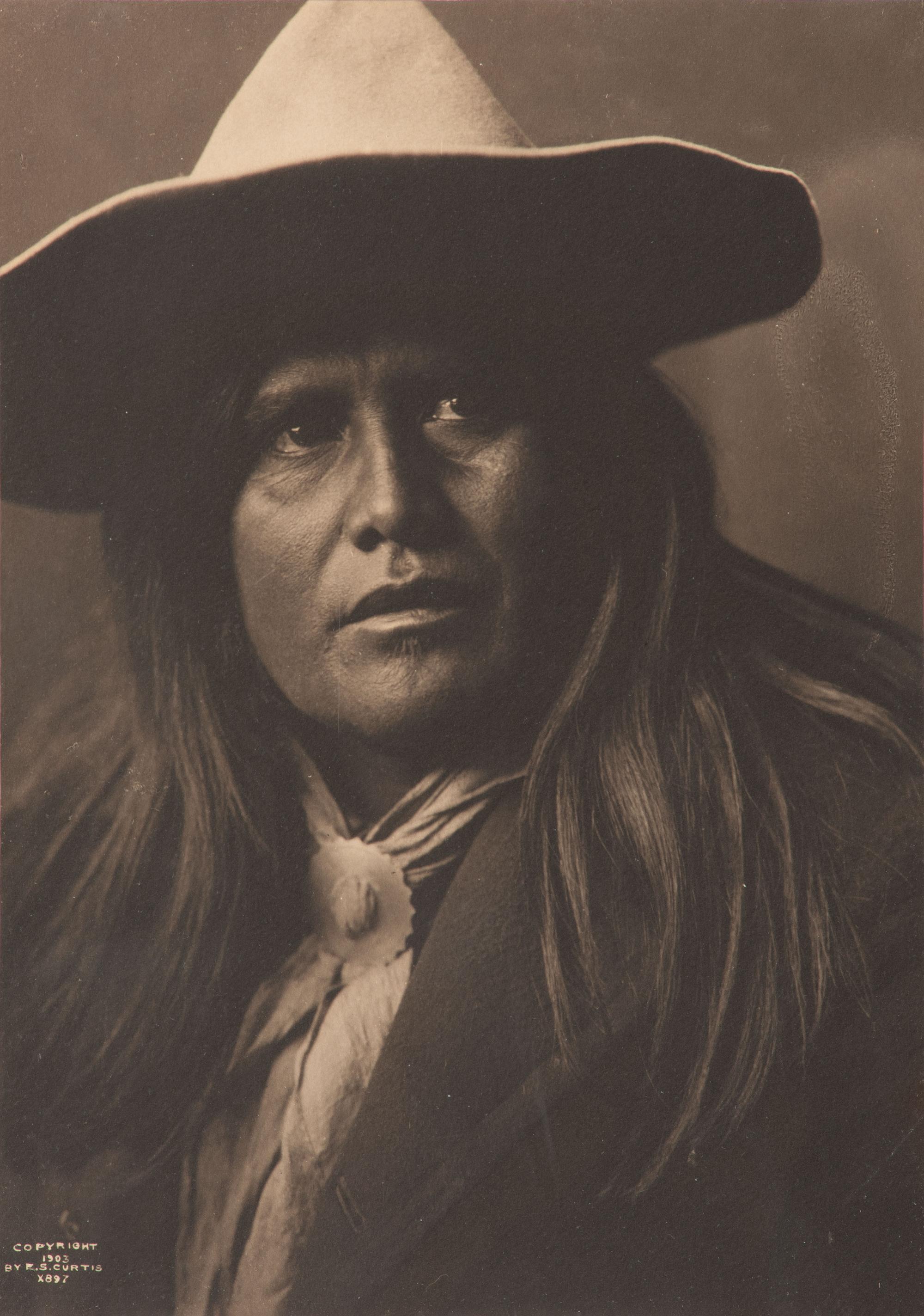 CURTIS, Edward S (1868-1952), photographer. 3 works, including two platinum photographs of a Native American subjects.