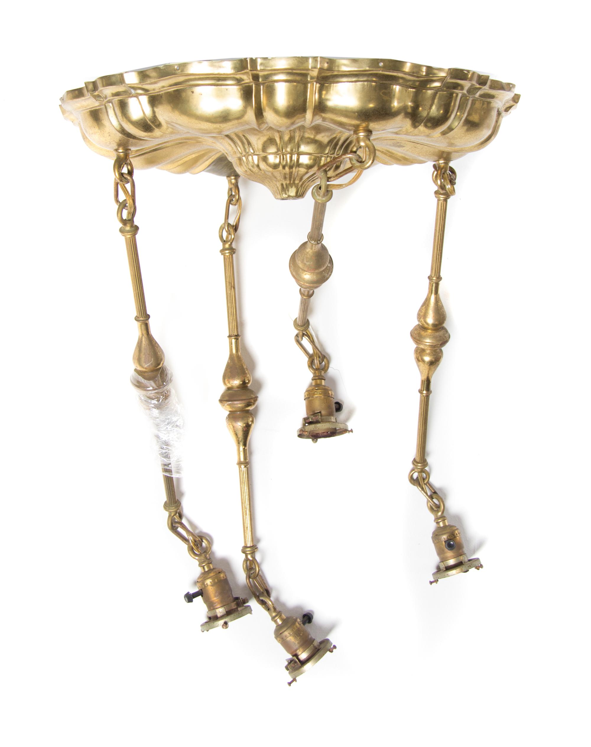 Steuben, EARLY 20TH CENTURY, a glass and gilt brass four-light fixture, having four Aurene pendent shades with pulled feather decoratio