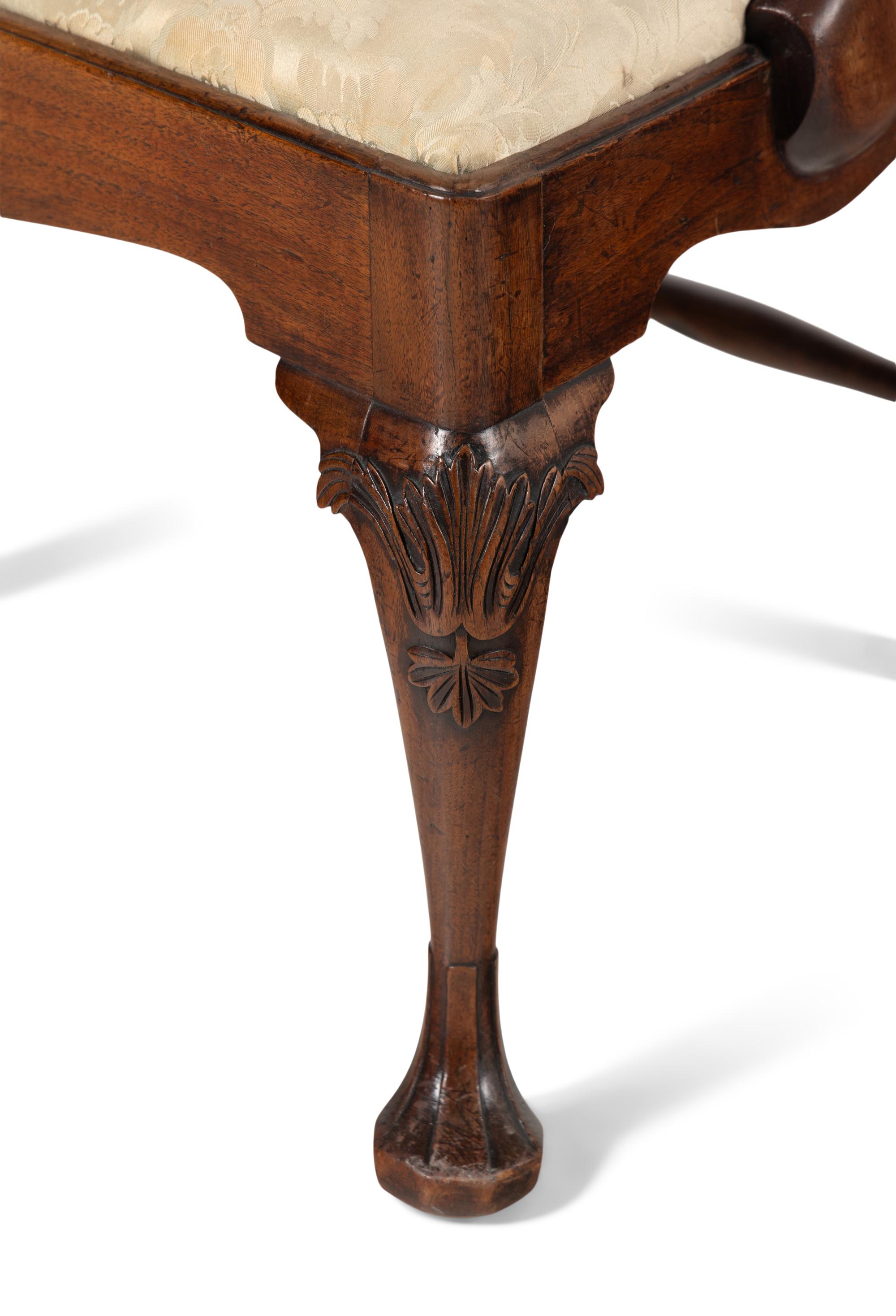 A George III Carved Mahogany Armchair