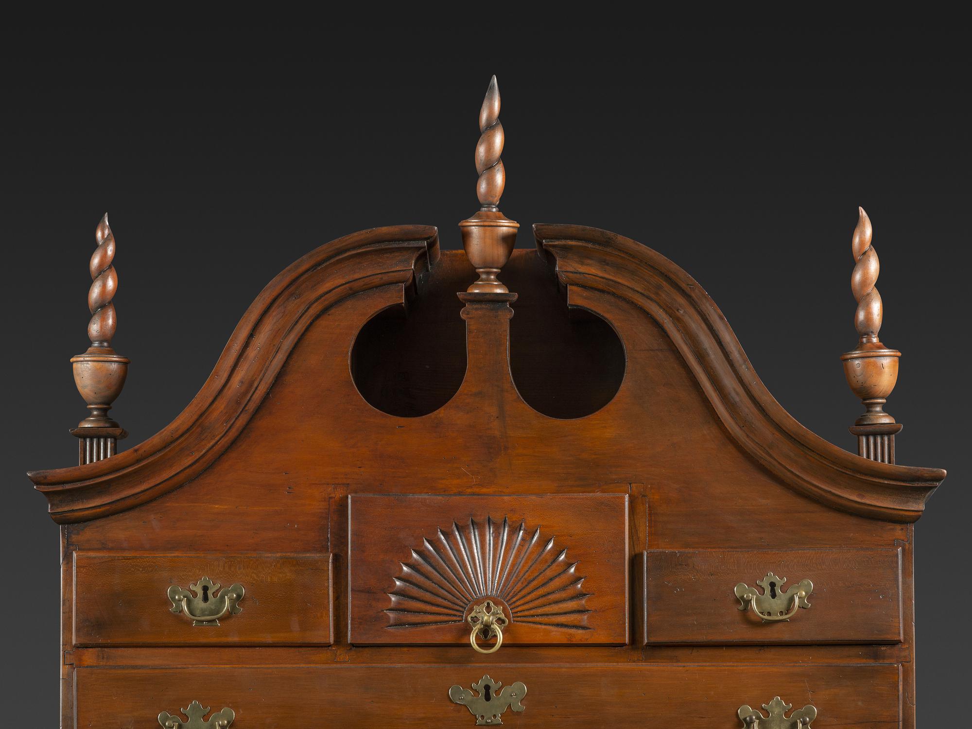 A Queen Anne Fan-Carved Cherrywood Bonnet Top High Chest