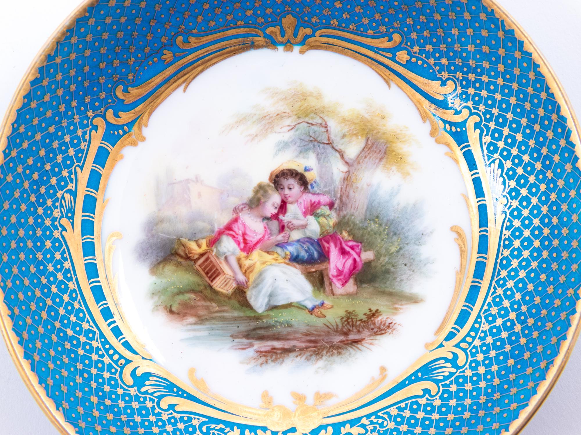 Eight Sèvres Style Painted and Parcel Gilt Porcelain Articles