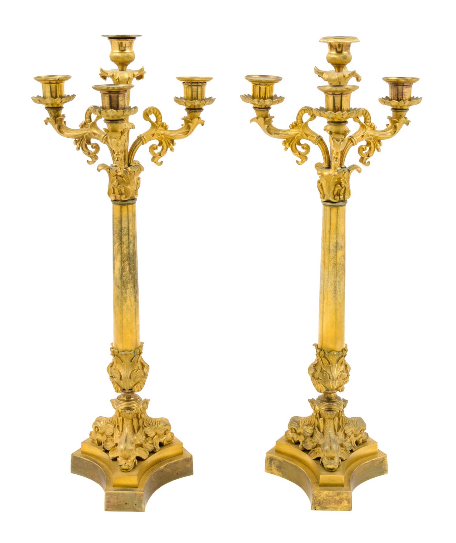 A Pair of Neoclassical Gilt Bronze Four-Light Candelabra Height 21 1/2 inches.