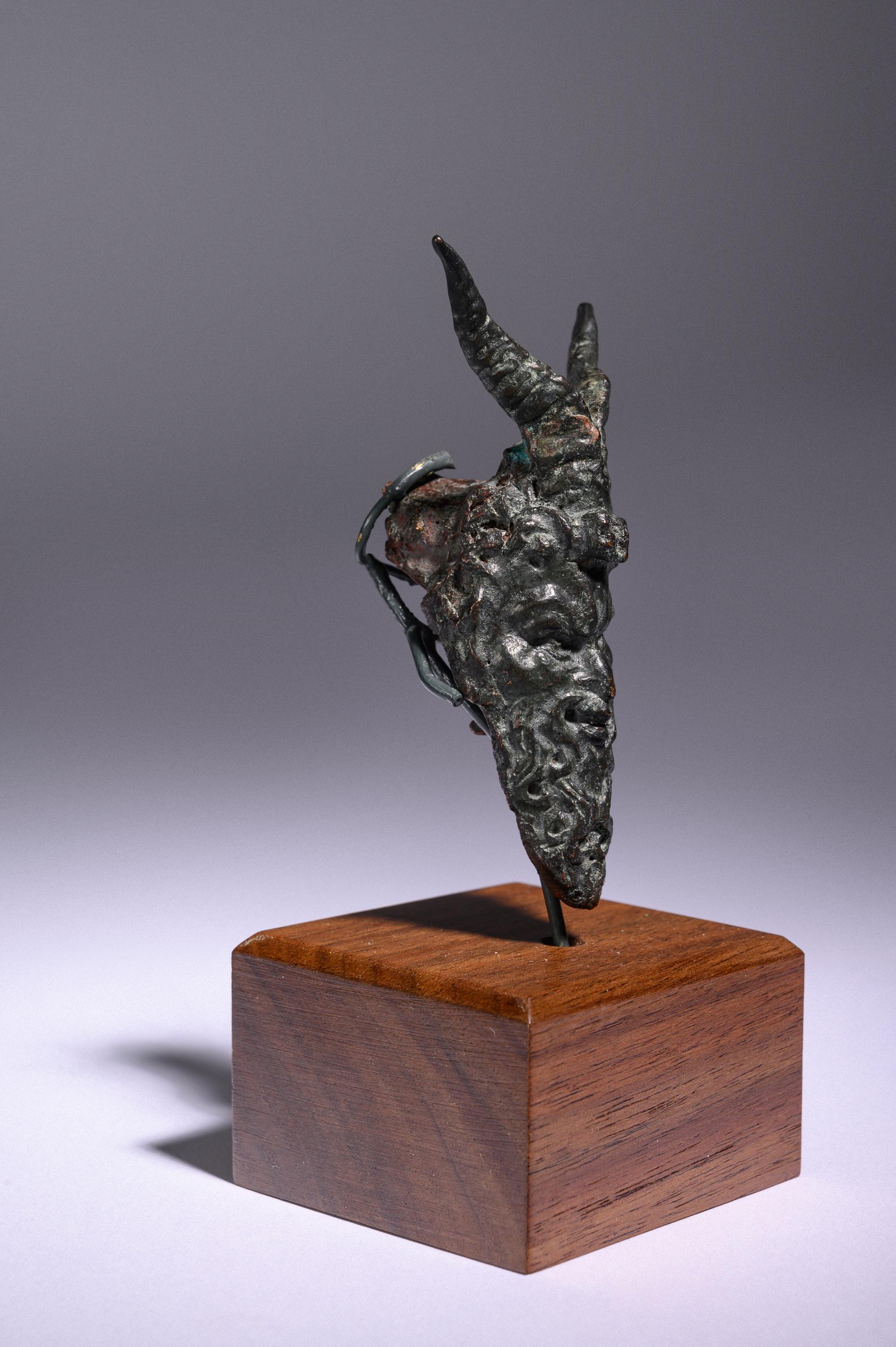 A Roman Bronze Satyr Head Applique