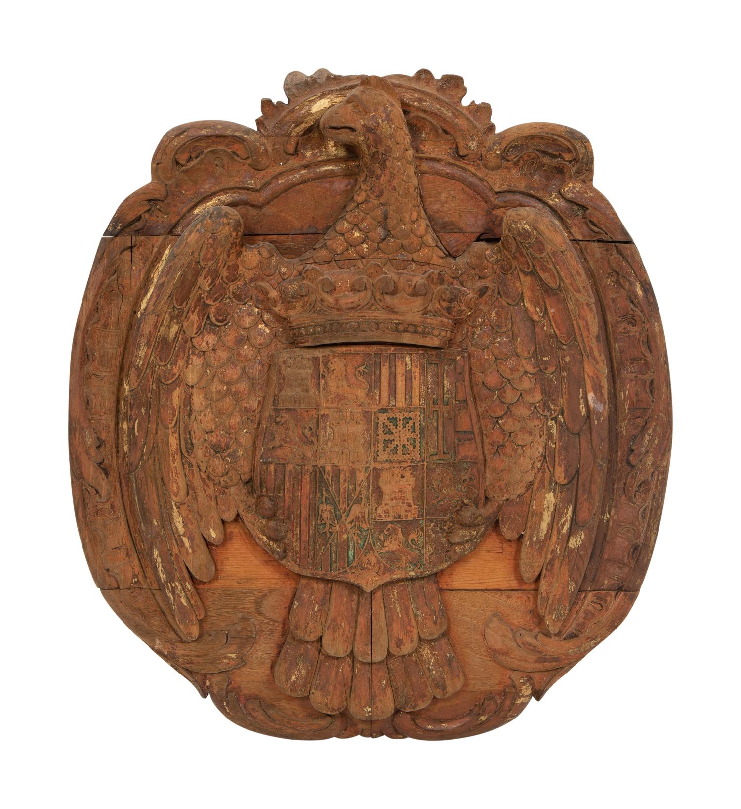 A Continental Carved, Parcel Gilt and Polychrome Painted Heraldic Crest