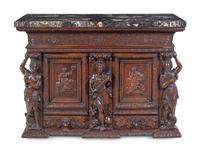 A Renaissance Revival Carved Walnut Marble-Top Cabinet