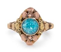 A 10 Karat Bicolor Gold and Blue Zircon Floral Motif Ring,