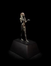 An Egyptian Bronze King or Deity as a Nude Offering-Bearer