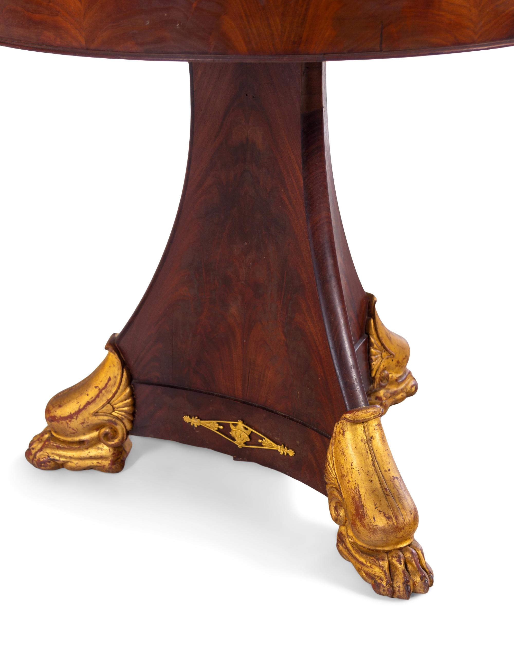 An Empire Style Parcel Gilt Mahogany Marble-Top Center Table
