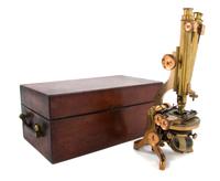 An English Lacquered Brass Binocular Microscope Height of case 17 1/2 inches. — HENRY CROUCH, LONDON, 19TH CENTURY