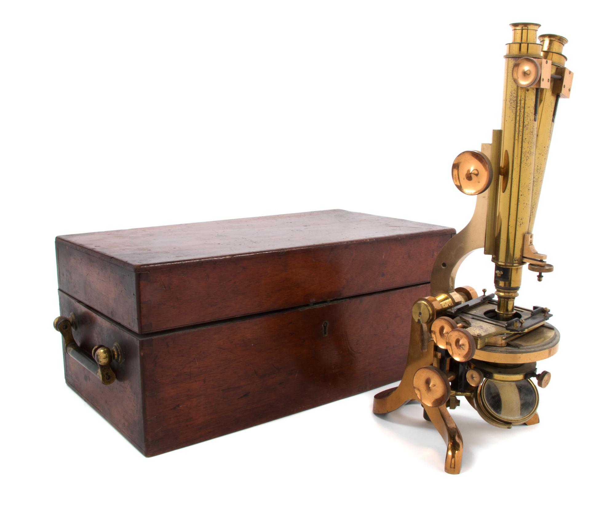 An English Lacquered Brass Binocular Microscope Height of case 17 1/2 inches. — HENRY CROUCH, LONDON, 19TH CENTURY