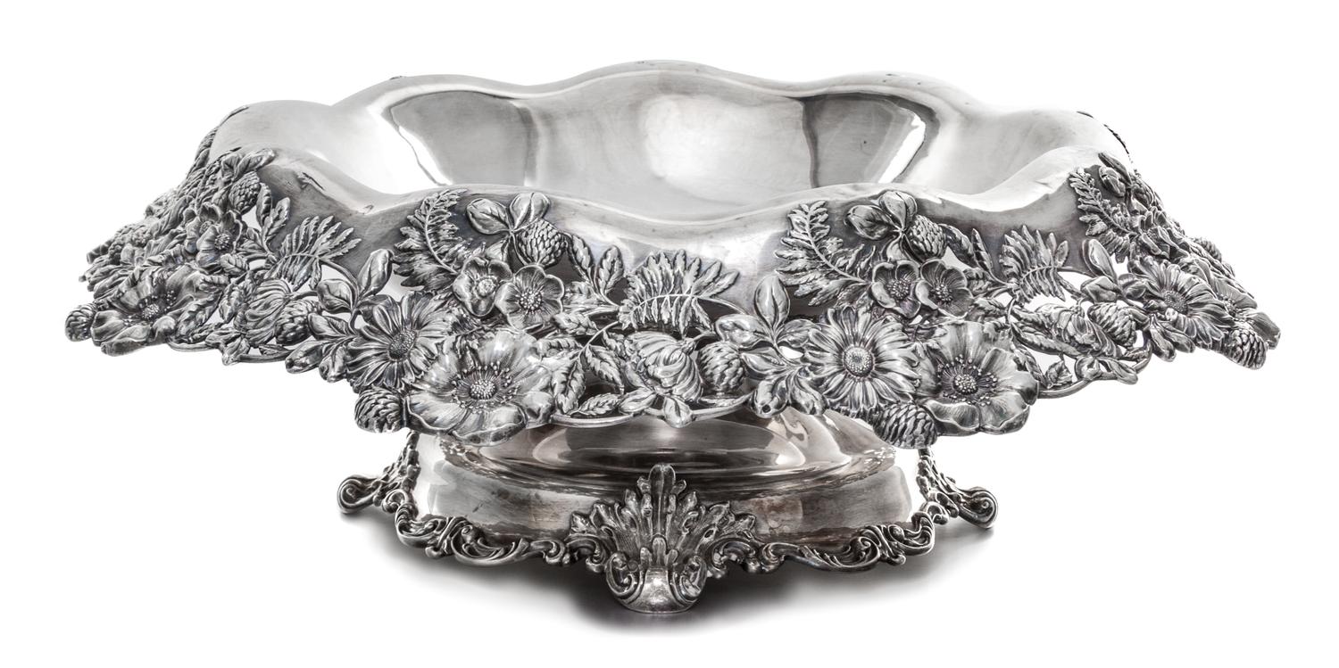 An American Silver Centerpiece Bowl, Graff, Washbourn & Dunn, New York, NY, the rim worked with floral and foliate elements on a pierce