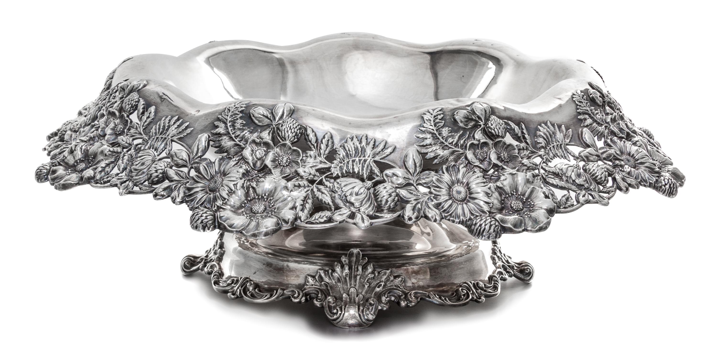 An American Silver Centerpiece Bowl, Graff, Washbourn & Dunn, New York, NY, the rim worked with floral and foliate elements on a pierce