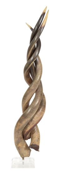 A Group of Three Entwined Horns Height 40 inches. — 20TH CENTURY