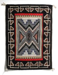 A Contemporary Teec Nos Pas Saddle Blanket 35 x 24 1/2 inches.
