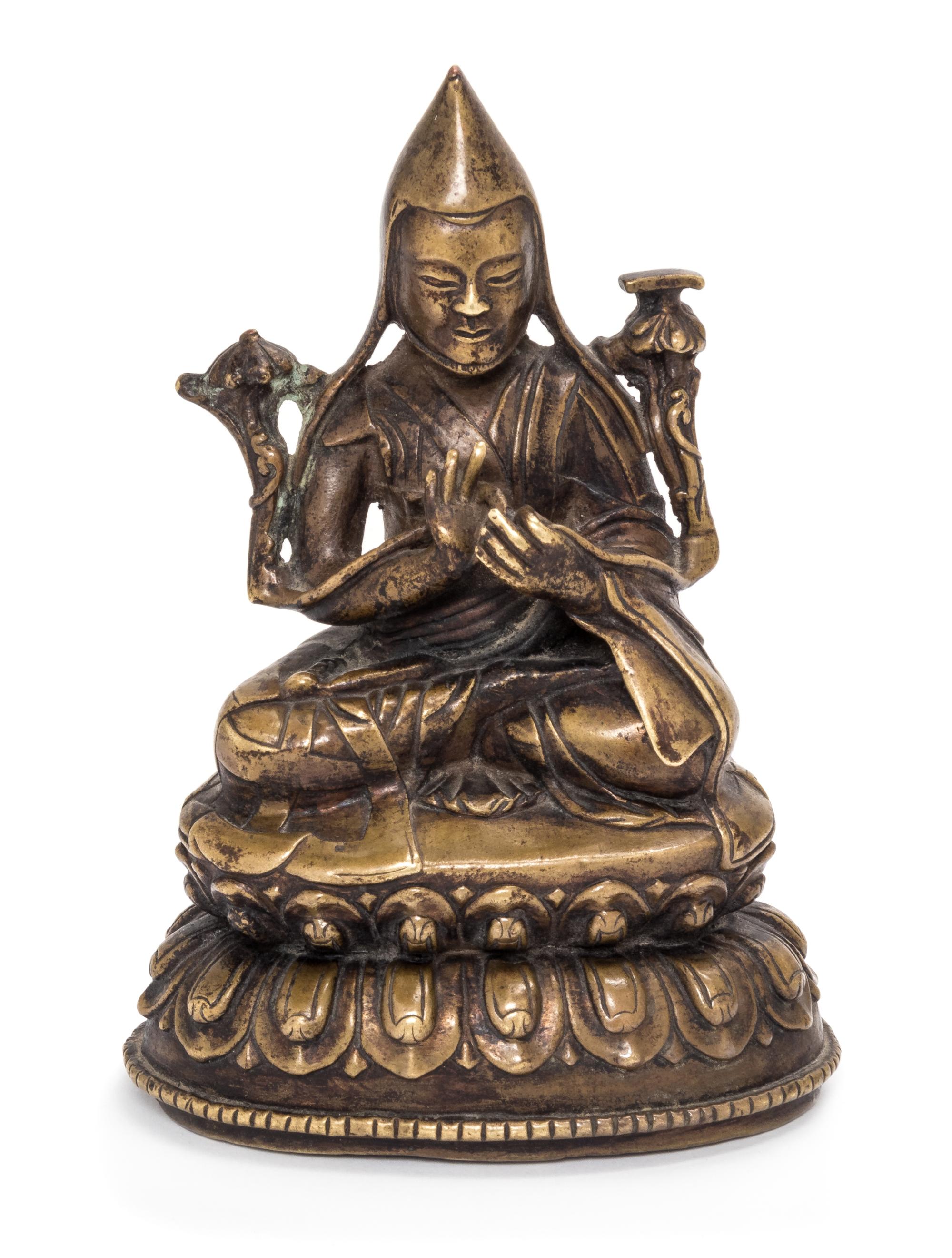 A Sino-Tibetan Copper Figure of Lama Height 5 1/2 inches. — 19TH CENTURY