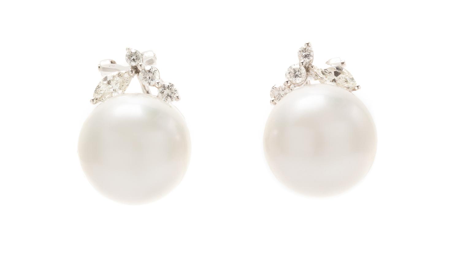 A Pair of 18 Karat White Gold, Cultured South Sea Pearl and Diamond Earclips, 7.40 dwts.