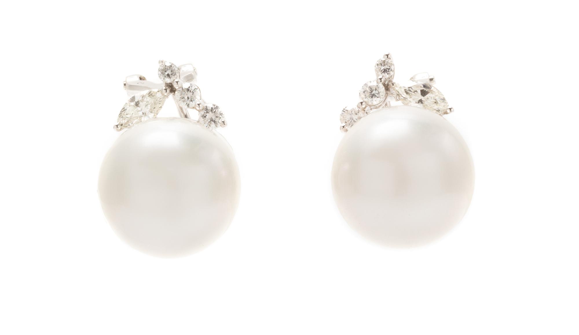 A Pair of 18 Karat White Gold, Cultured South Sea Pearl and Diamond Earclips, 7.40 dwts.