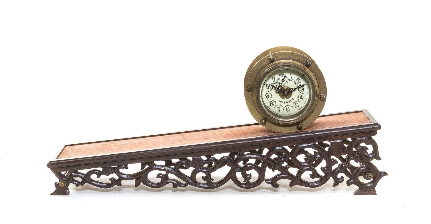 A Continental Incline Plane Clock, Diameter of clock 5 1/4 inches.