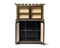 A Continental Ebonized and Parcel Gilt Bookcase