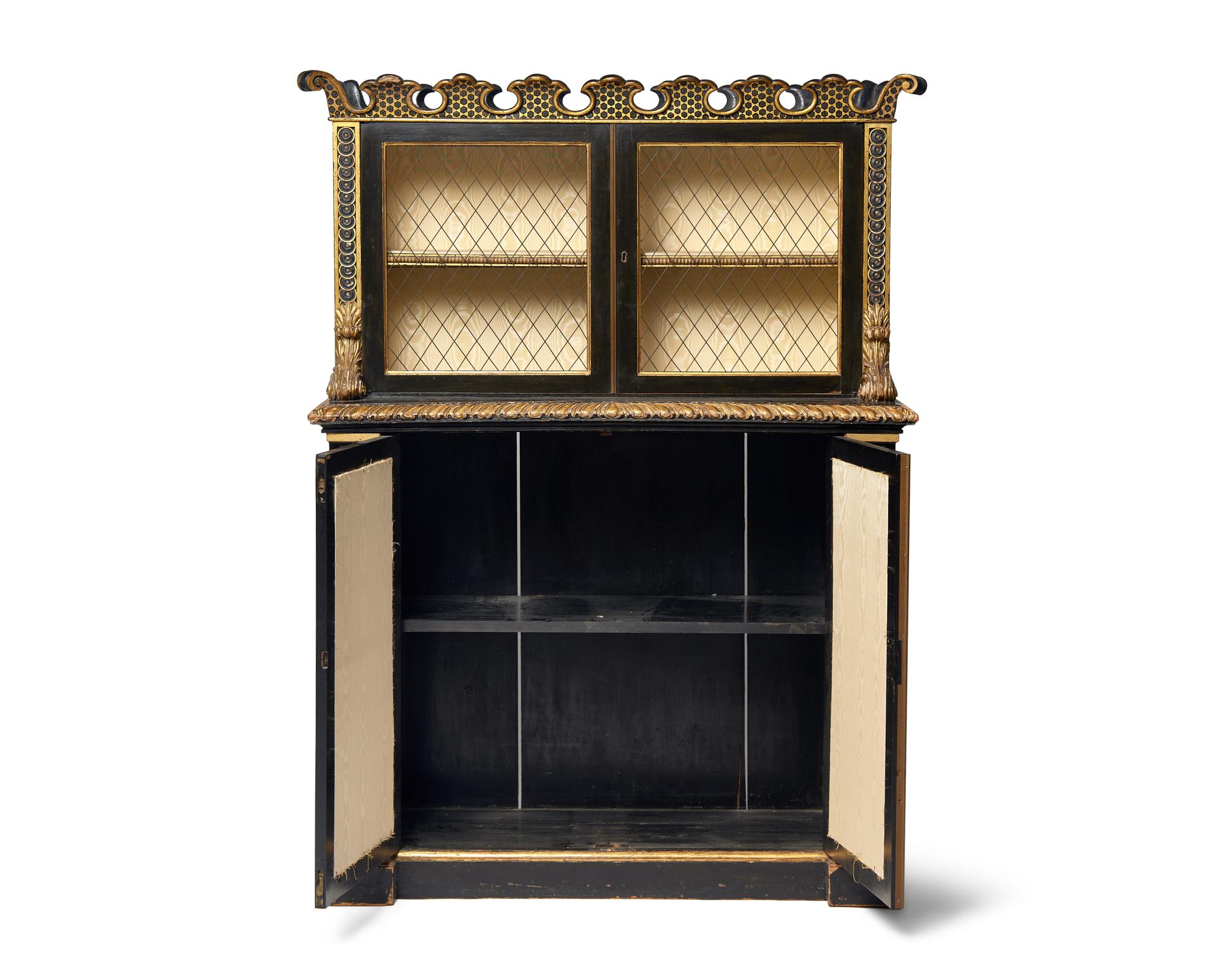 A Continental Ebonized and Parcel Gilt Bookcase