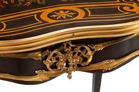 A Pair of Louis XVI Style Gilt Bronze Mounted Marquetry Tables