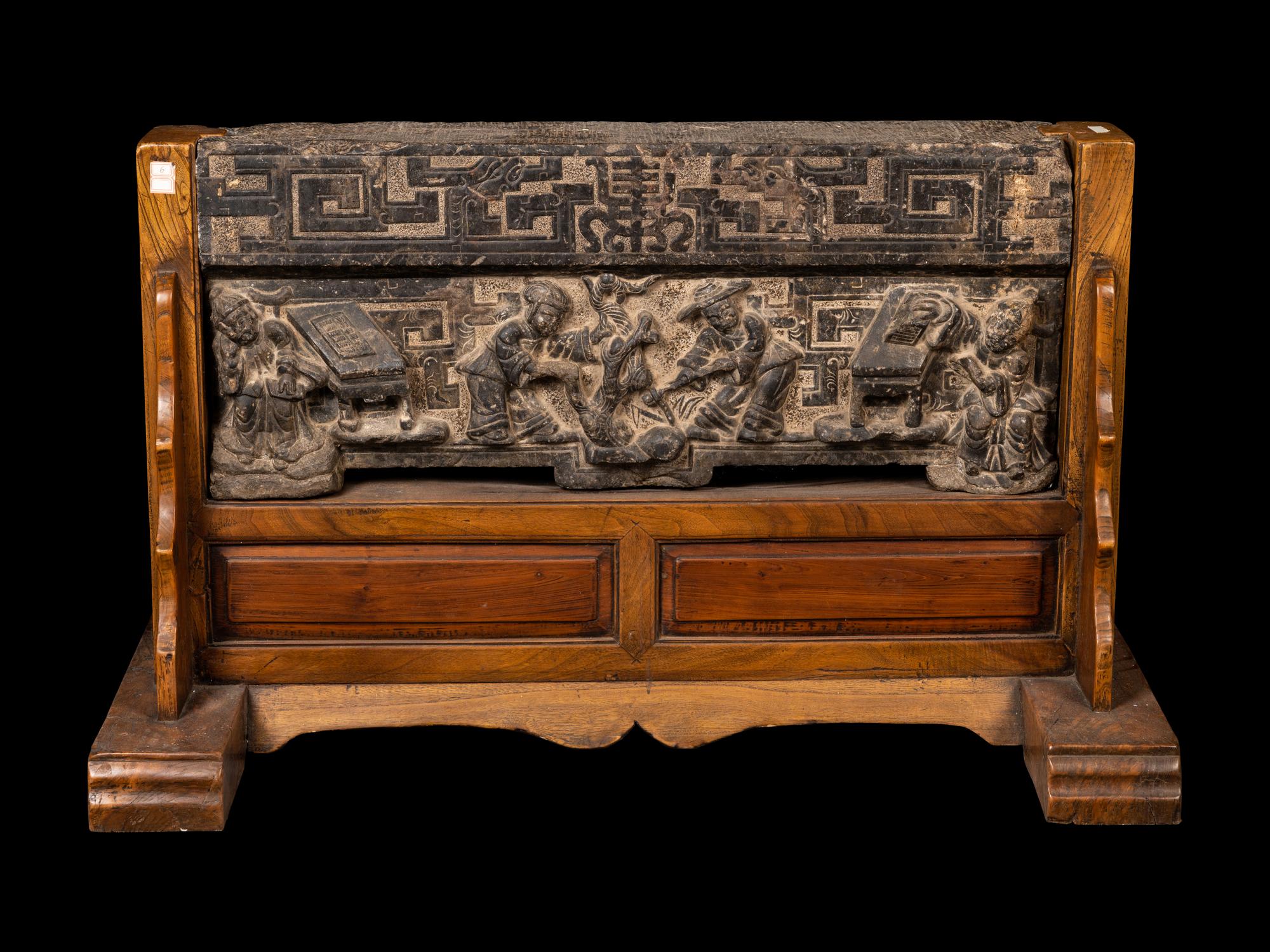 A Chinese Relief Carved Stone Stele Panel on Fitted Wood Stand