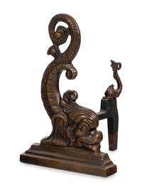 A Pair of Dolphin-Form Andirons and a Fender