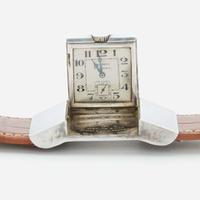 A sterling silver golf belt watch, Hermes C.1920