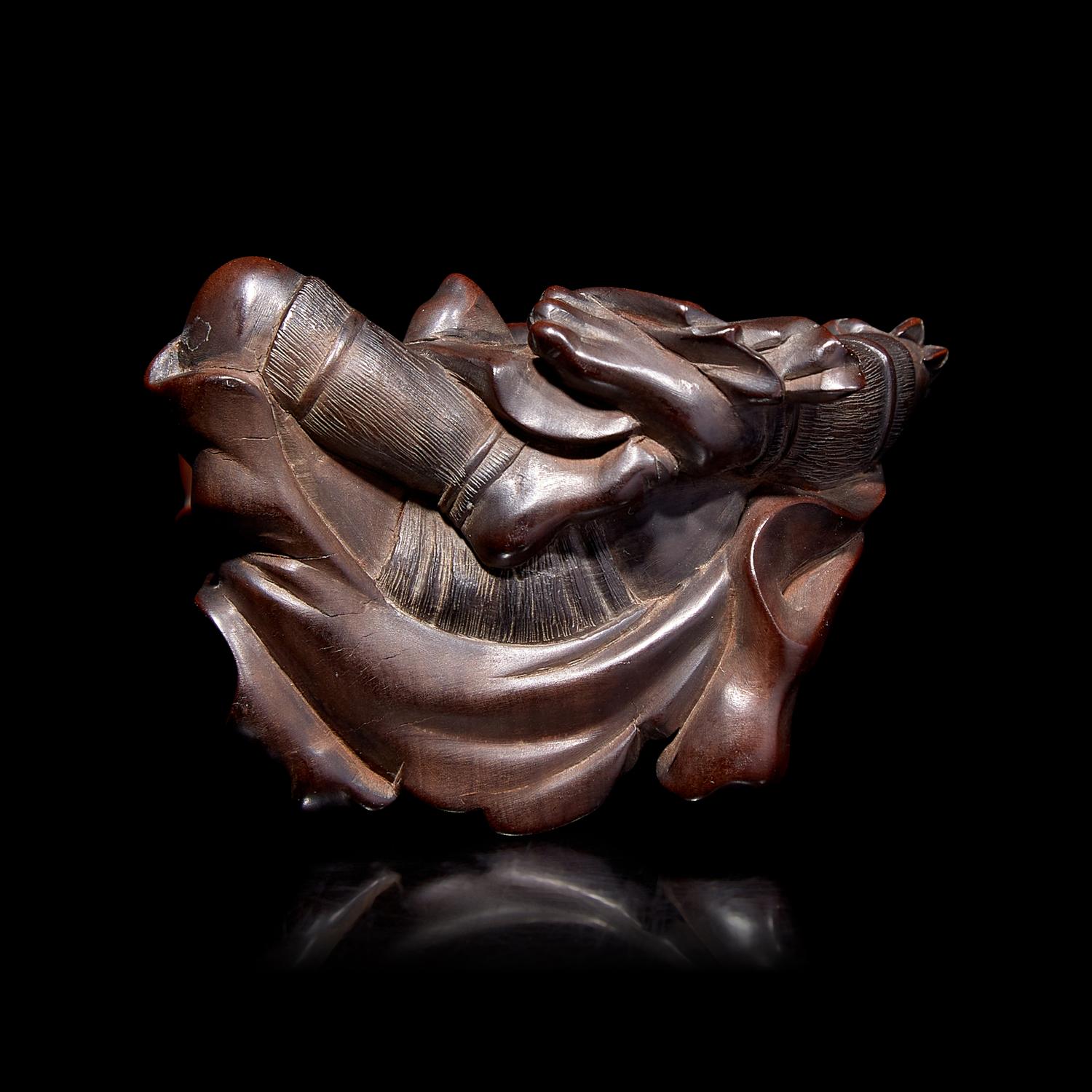 A Japanese Carved Boxwood "Oni" Okimono, Meiji Period