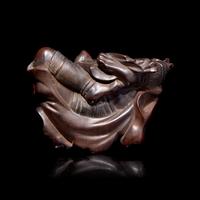 A Japanese Carved Boxwood "Oni" Okimono, Meiji Period