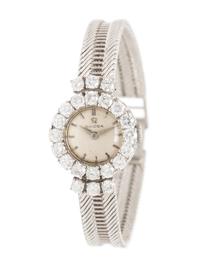 OMEGA, WHITE GOLD AND DIAMOND WATCH