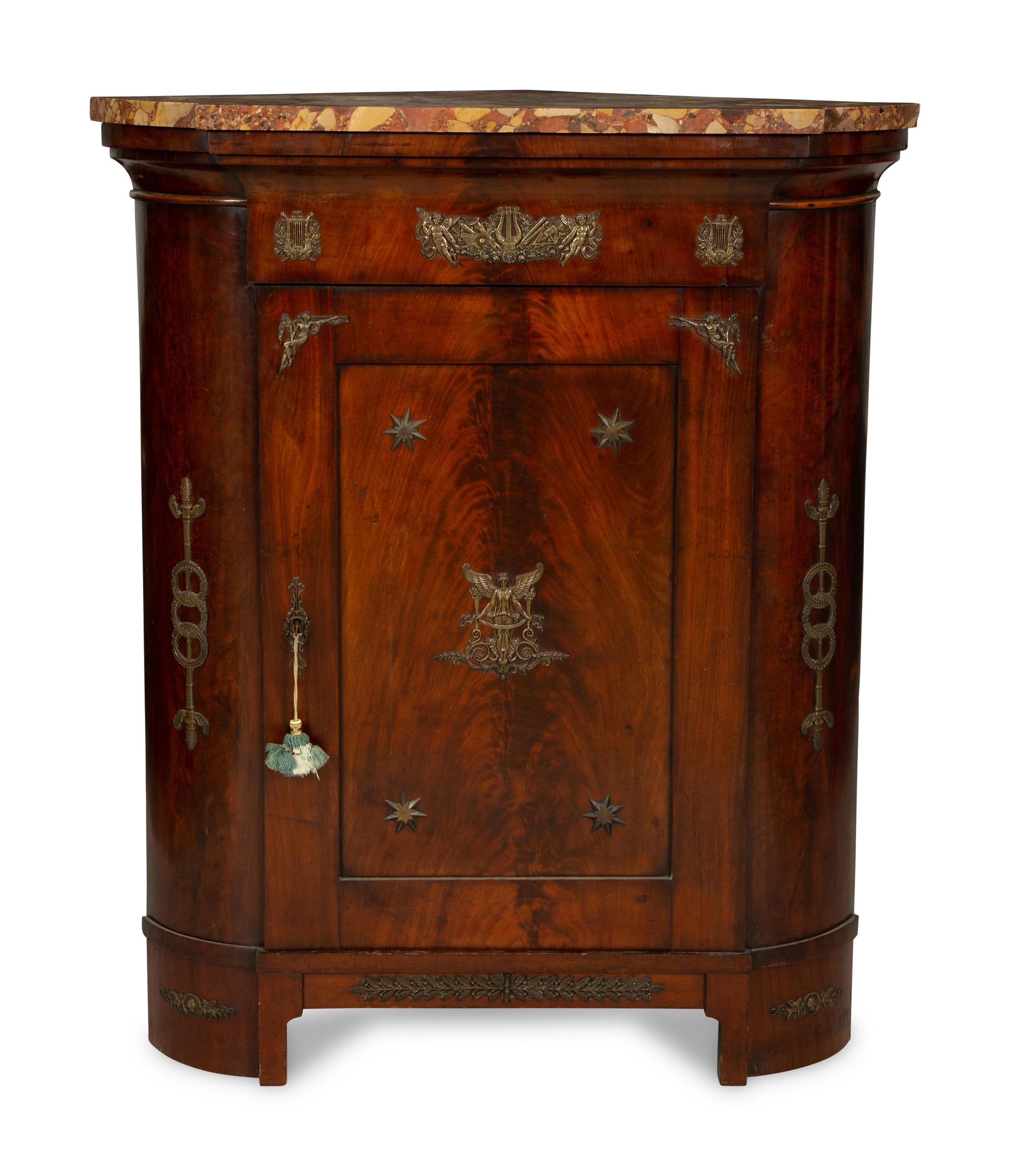 An Empire Gilt Bronze Mounted Mahogany Encoignure with a Brèche d'Alep Marble Top