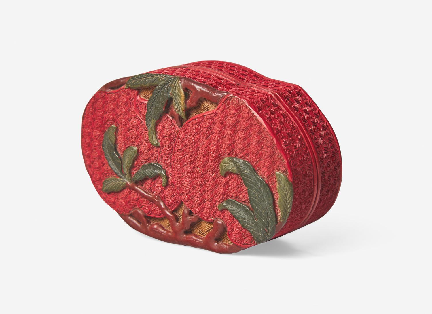A Chinese Polychromed Cinnabar Lacquer 'Peaches' Covered Box