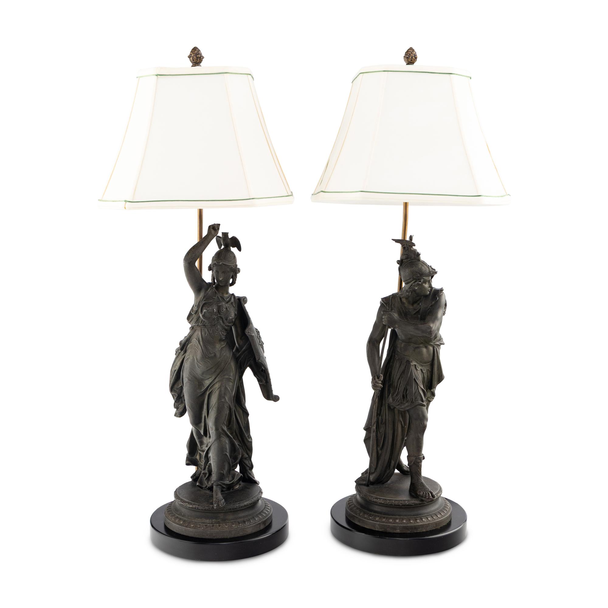 A Pair of French Cast Metal Figures Mounted as Lamps