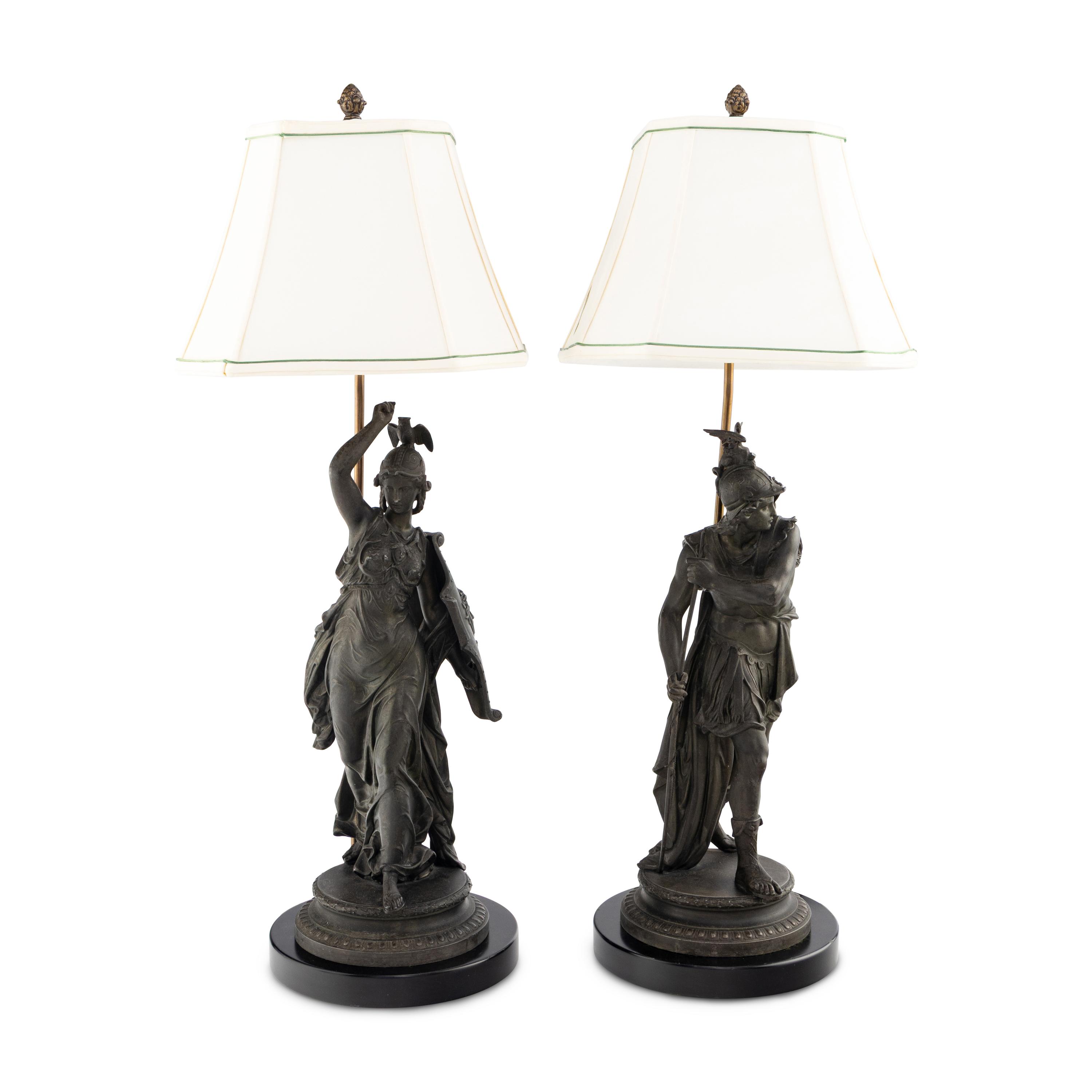 A Pair of French Cast Metal Figures Mounted as Lamps