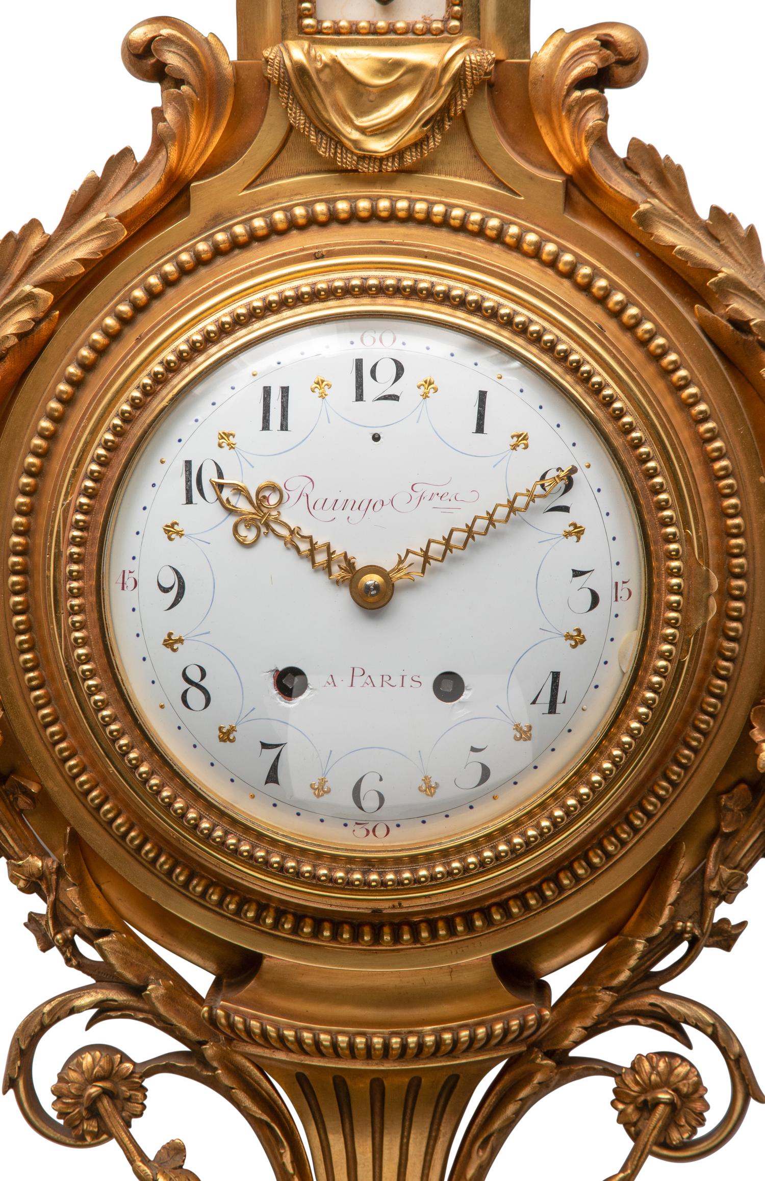 A French Gilt Bronze Clock and Barometer