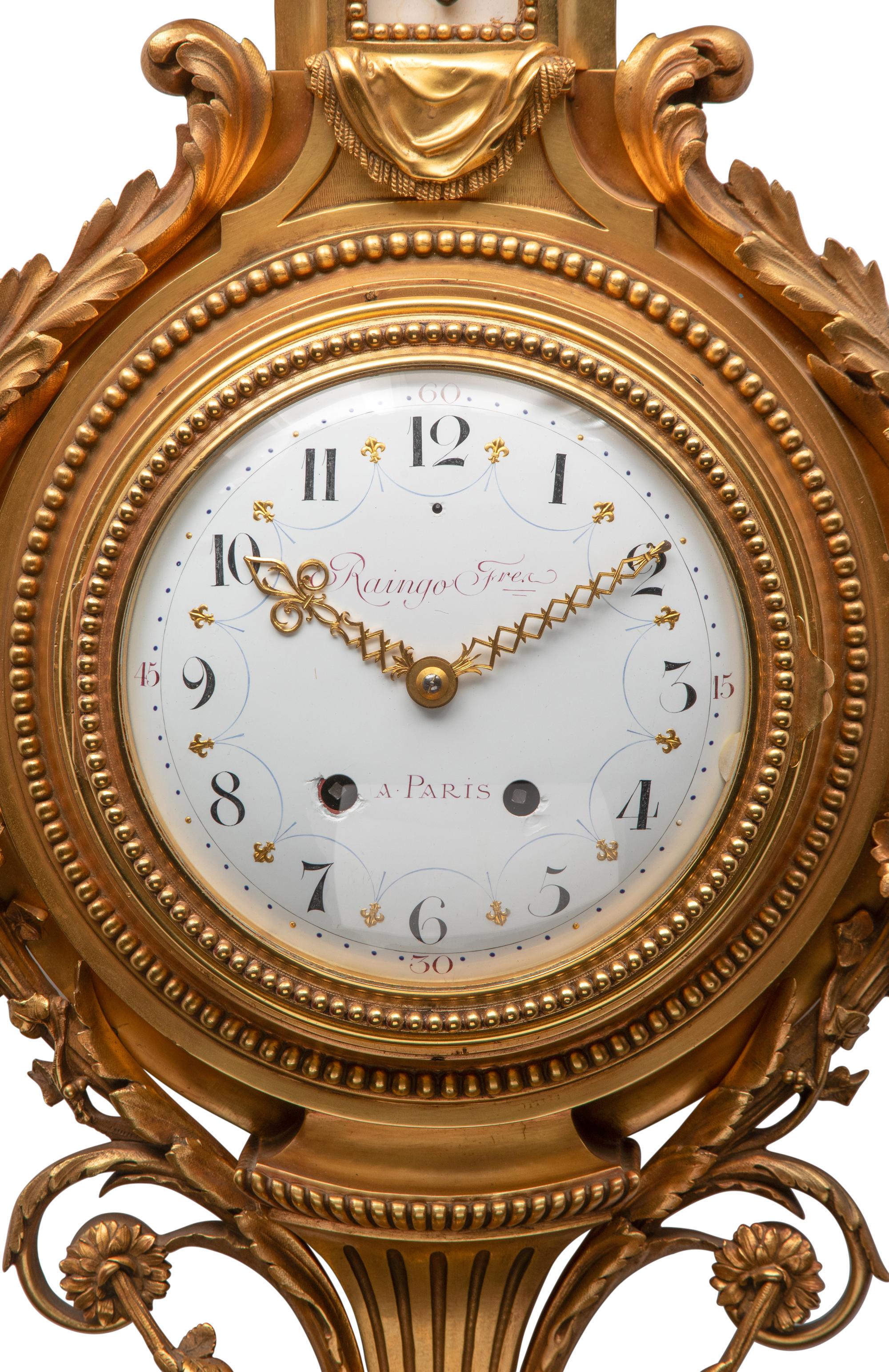 A French Gilt Bronze Clock and Barometer