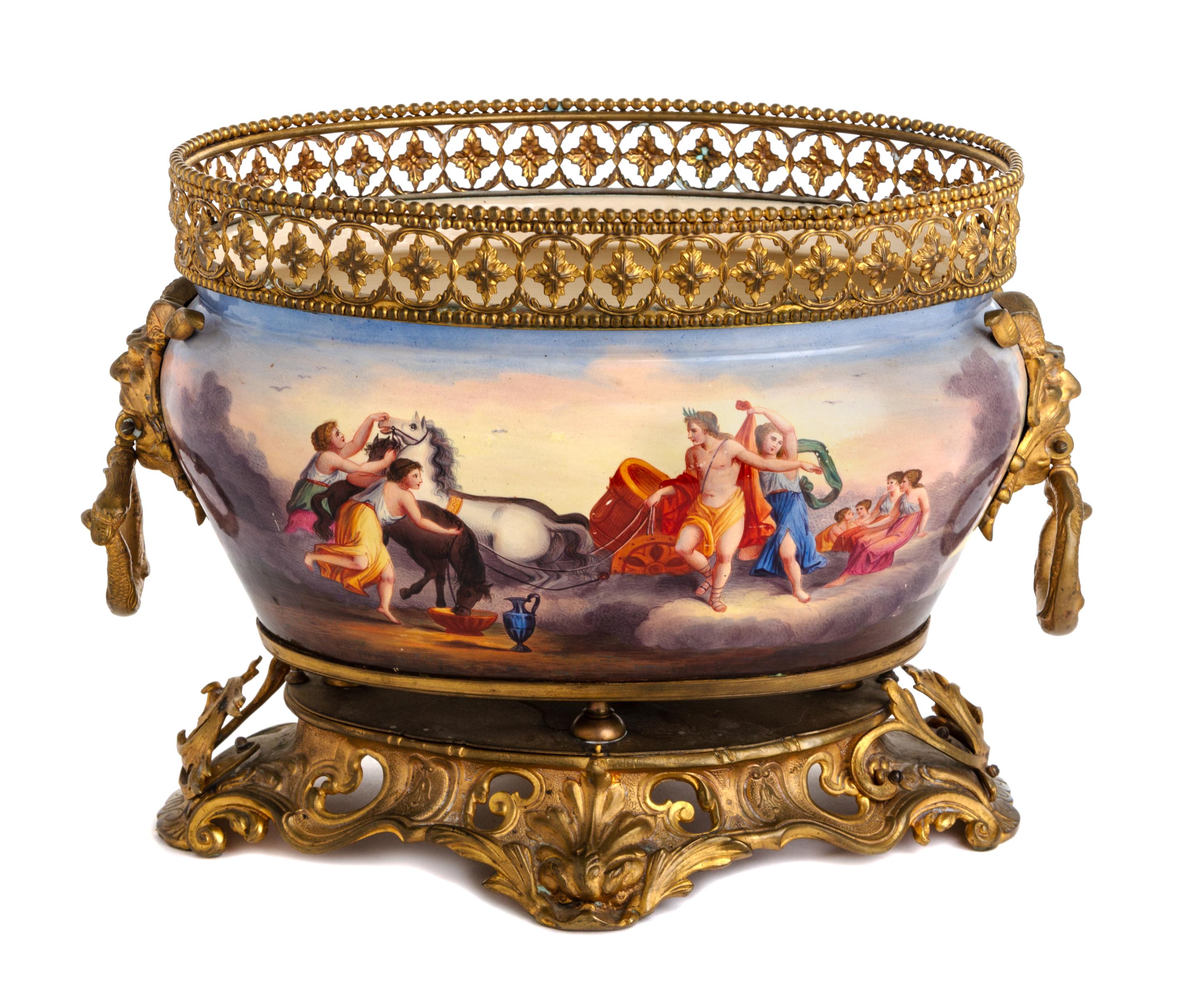 A Continental Gilt Metal Mounted Ceramic Jardiniere Width 13 inches. — LATE 19TH CENTURY