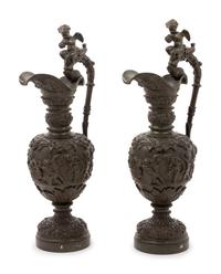 A Pair of Neoclassical Patinated Bronze Ewers with Bacchic Putti