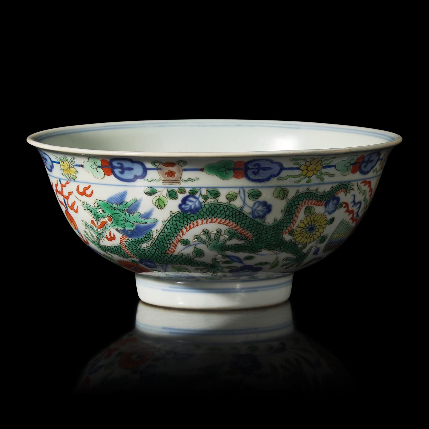 A Chinese Wucai Porcelain 'Dragon and Phoenix' Bowl, Qianlong Mark and of The Period 清乾隆 五彩龍鳳紋宮盌