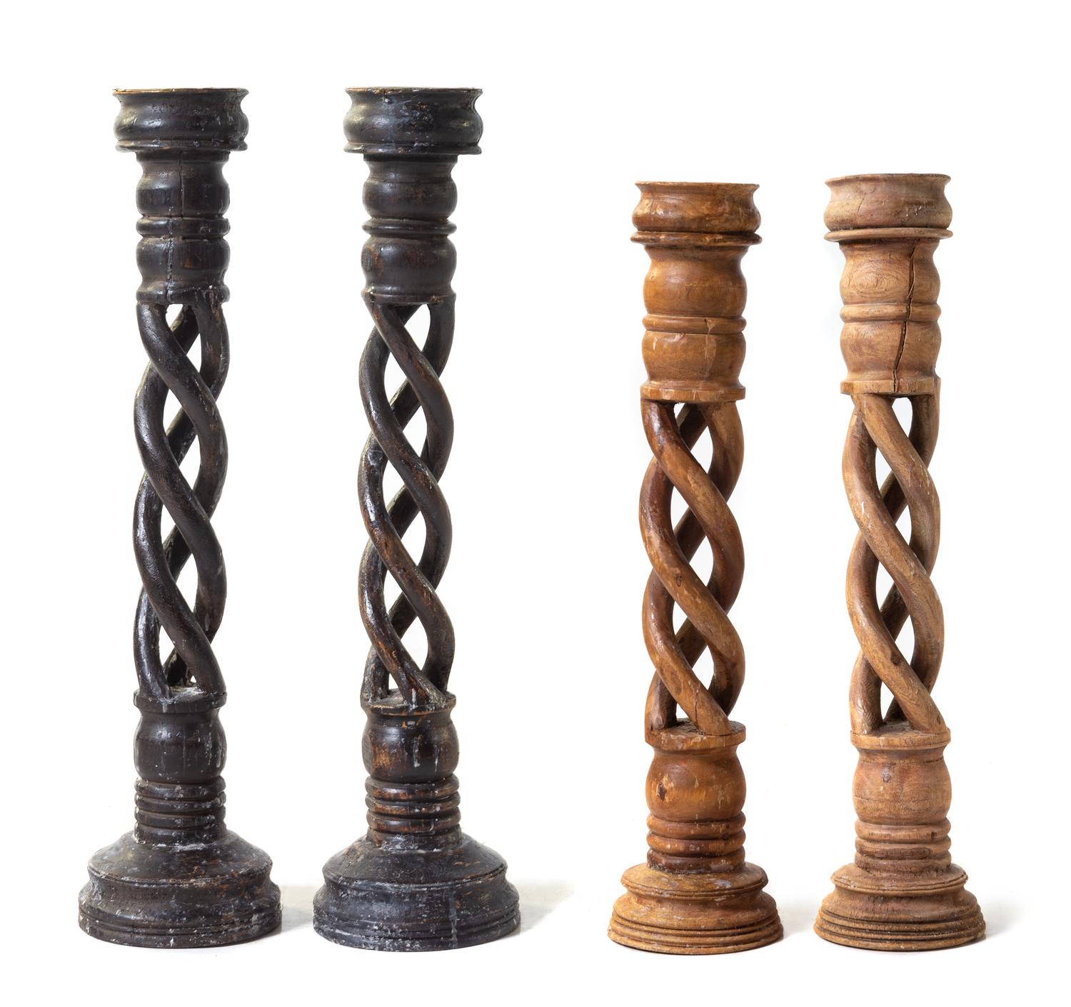 Two Pairs of Carved Barley Twist Candlesticks