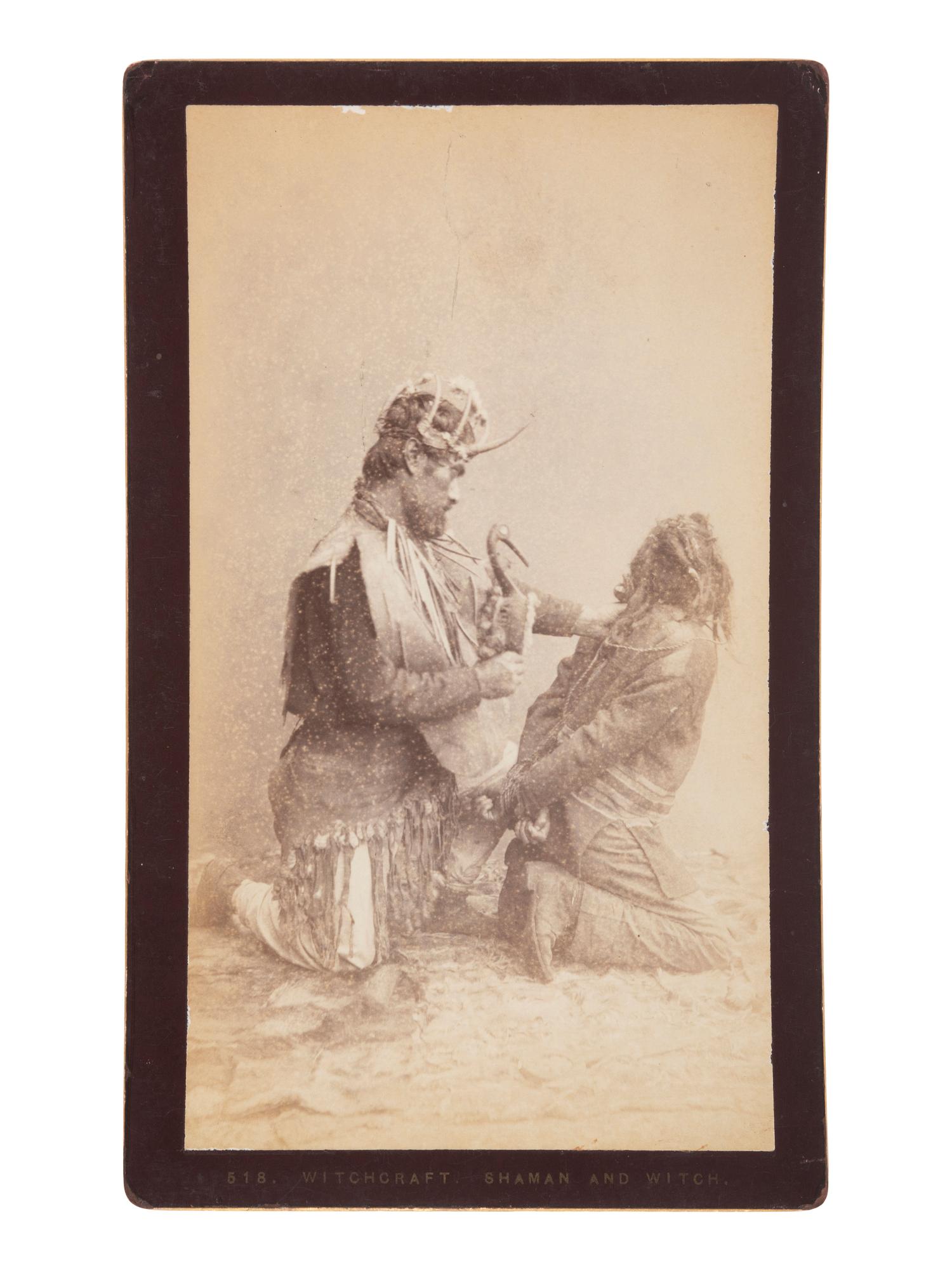 [NATIVE AMERICANS] DE GROFF, Edward, photog. 2 boudoir cards of a Haida shaman. Sitka, AK, ca 1890.