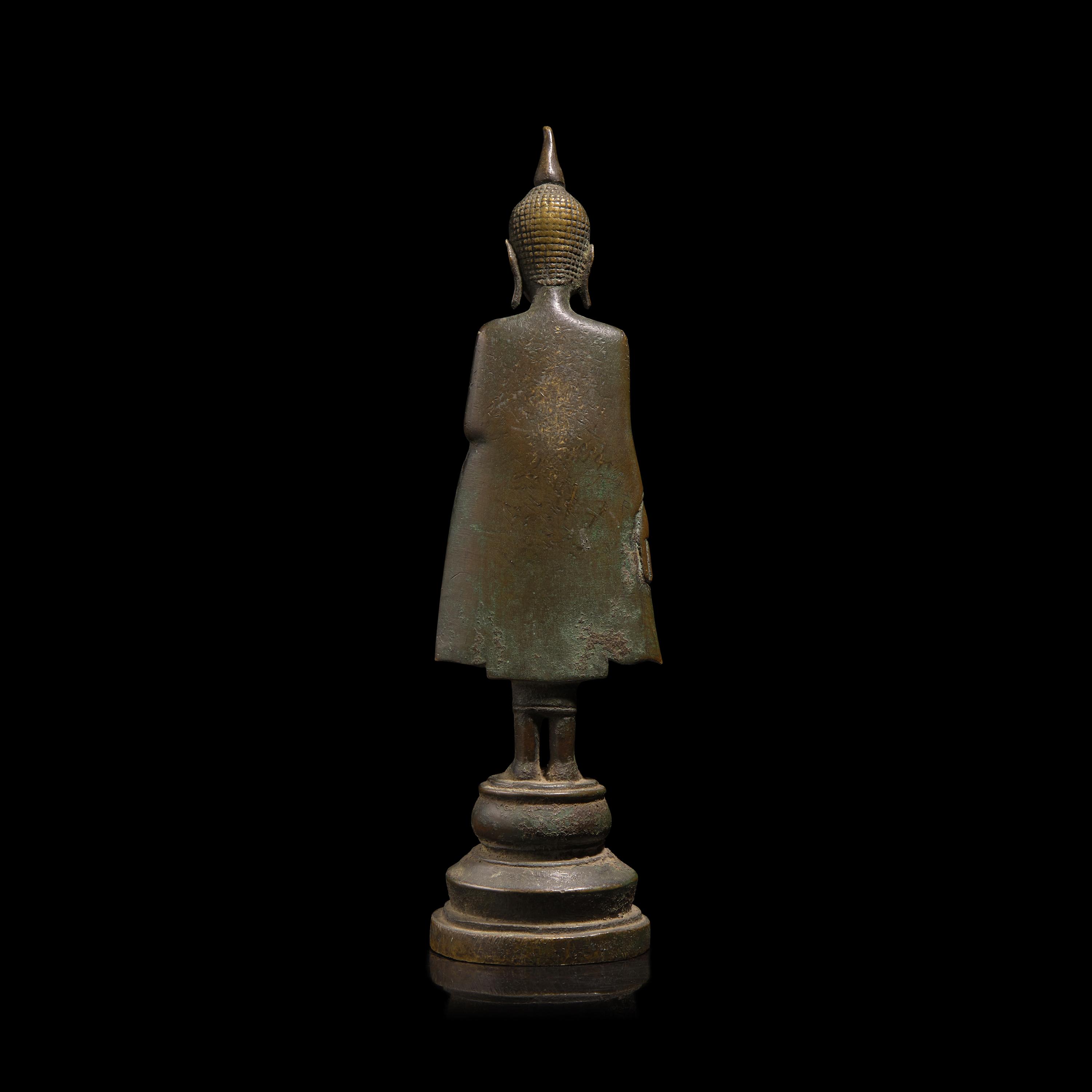 An Eastern Thai Bronze 'Leaning Buddha', 17th–18th Century